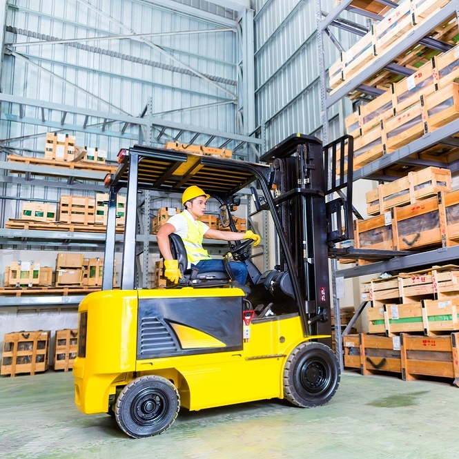 Forklift operating in a fulfilment warehouse